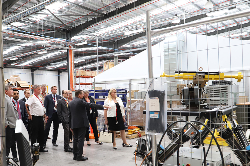 UK Delegation Visit UK Delegation Group Tour of EOS ACT Manufacturing facility